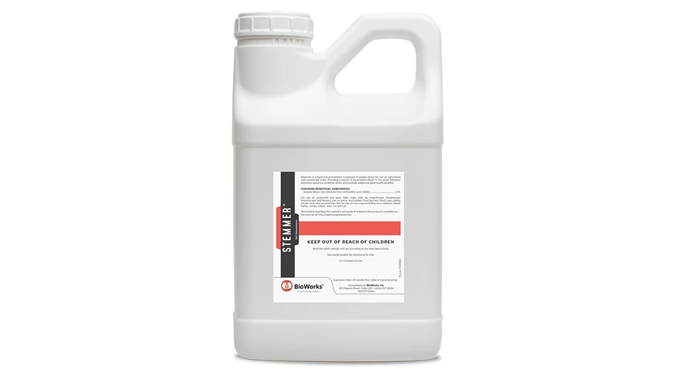 A white plastic jug with a black, white and orange label reading Stemmer.